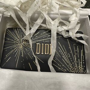 Dior Black and Gold Starburst Clutch